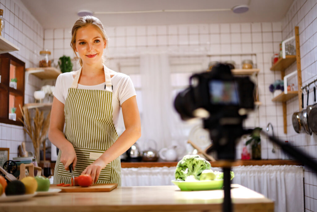 chef demoing how to cook in front of a camera